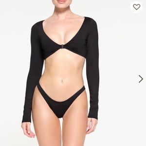 Skims long sleeve shrug